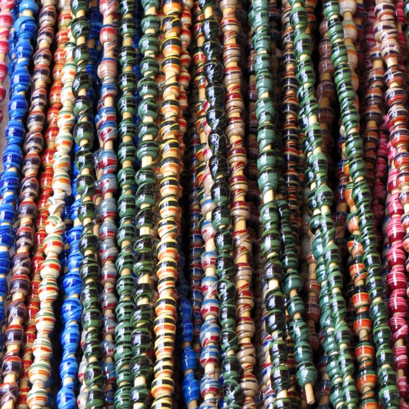 Sticks of recycled plastic beads
