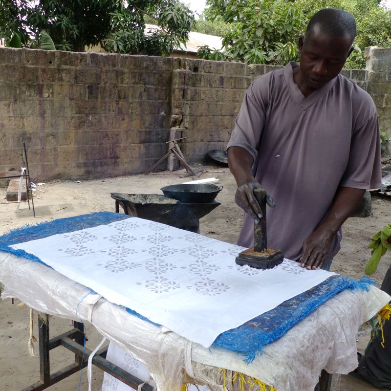 Musa Jaiteh wax stamping in The Gambia