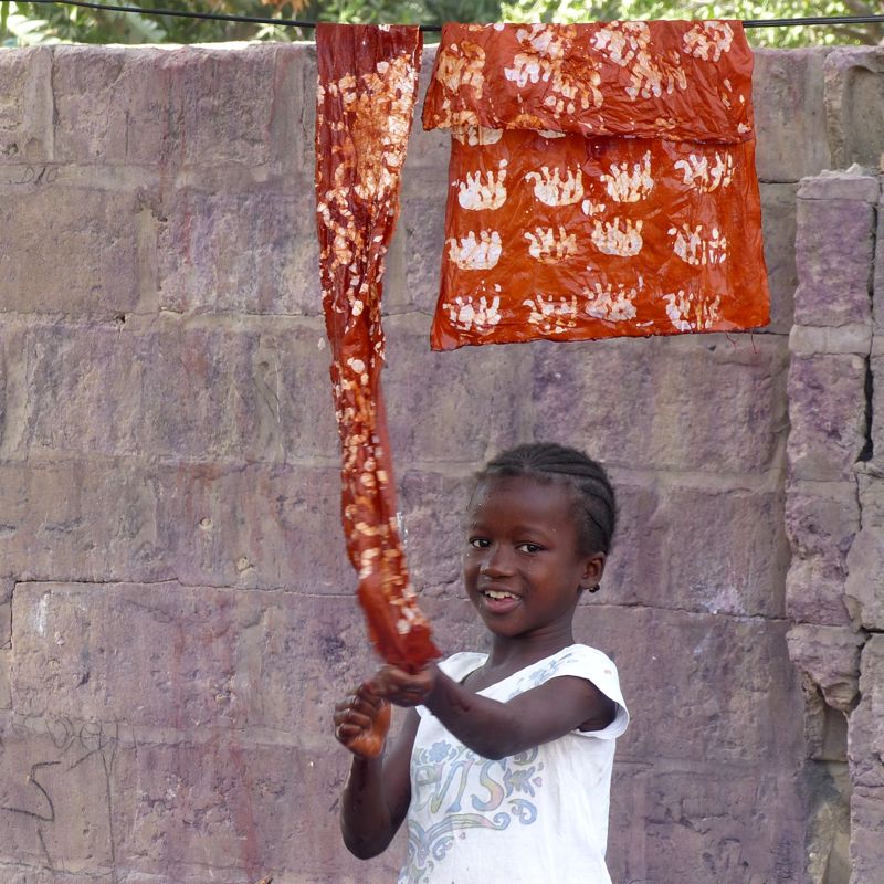 Young kola nut apprentice in Musa's compound